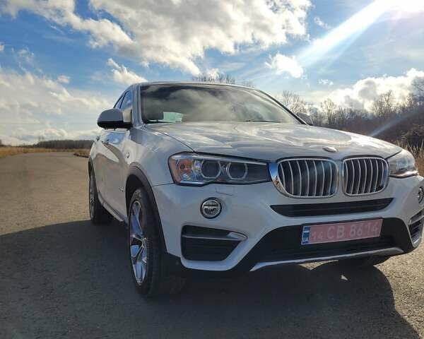 Белый БМВ Х4, объемом двигателя 2 л и пробегом 95 тыс. км за 20900 $, фото 2 на Automoto.ua