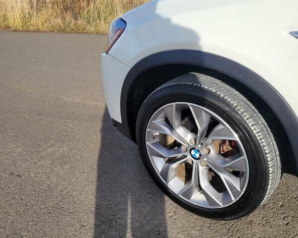 Белый БМВ Х4, объемом двигателя 2 л и пробегом 95 тыс. км за 20900 $, фото 26 на Automoto.ua