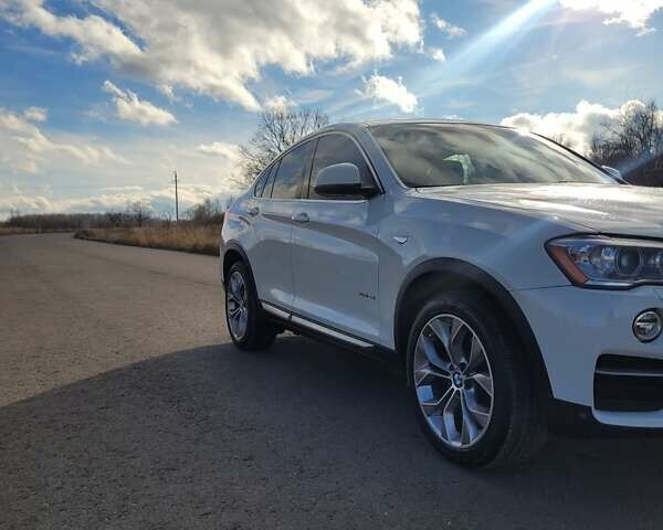 Белый БМВ Х4, объемом двигателя 2 л и пробегом 95 тыс. км за 20900 $, фото 5 на Automoto.ua