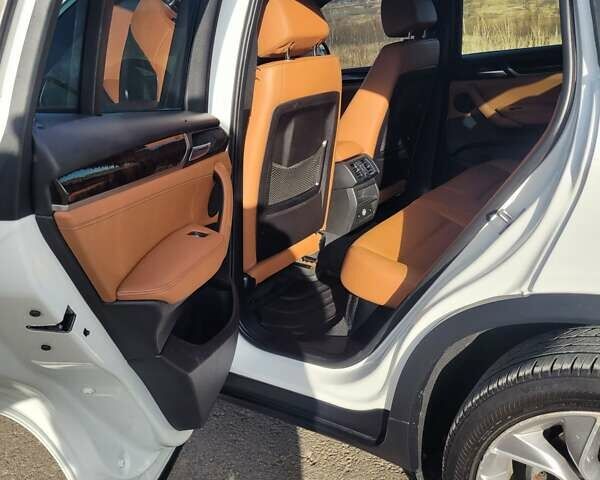 Белый БМВ Х4, объемом двигателя 2 л и пробегом 95 тыс. км за 20900 $, фото 40 на Automoto.ua
