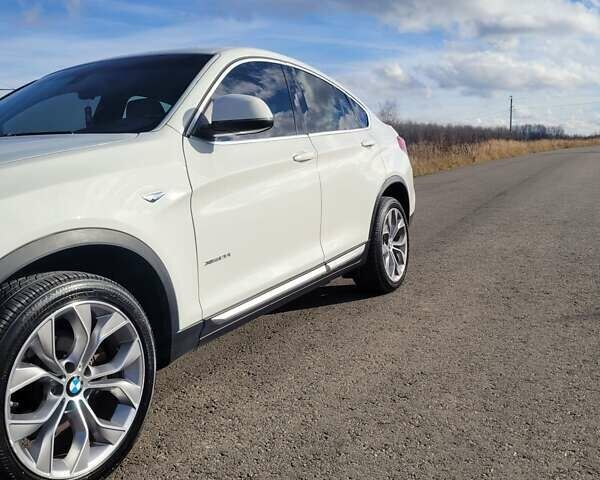 Белый БМВ Х4, объемом двигателя 2 л и пробегом 95 тыс. км за 20900 $, фото 20 на Automoto.ua