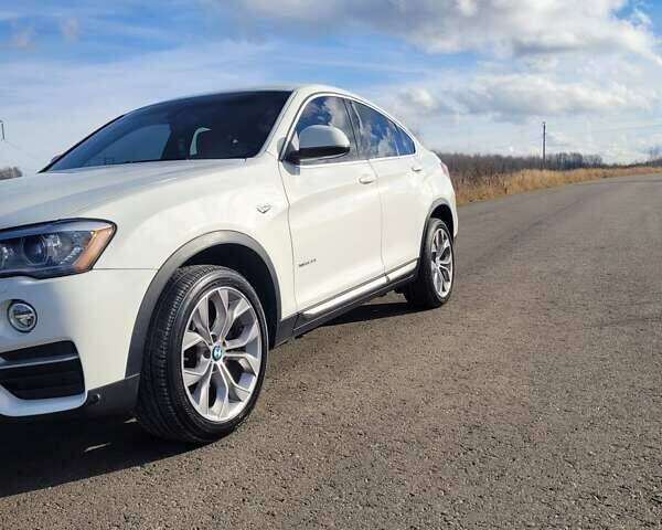 Белый БМВ Х4, объемом двигателя 2 л и пробегом 95 тыс. км за 20900 $, фото 22 на Automoto.ua