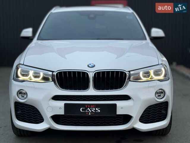 Белый БМВ Х4, объемом двигателя 2 л и пробегом 106 тыс. км за 28500 $, фото 5 на Automoto.ua
