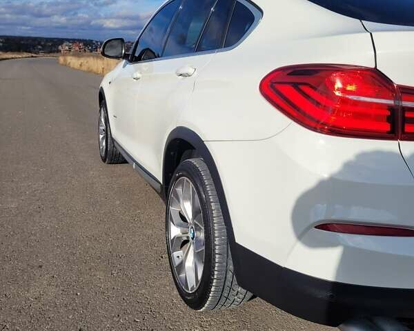 Белый БМВ Х4, объемом двигателя 2 л и пробегом 95 тыс. км за 20900 $, фото 18 на Automoto.ua