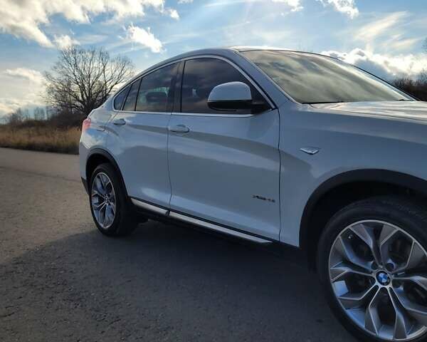 Белый БМВ Х4, объемом двигателя 2 л и пробегом 95 тыс. км за 20900 $, фото 6 на Automoto.ua