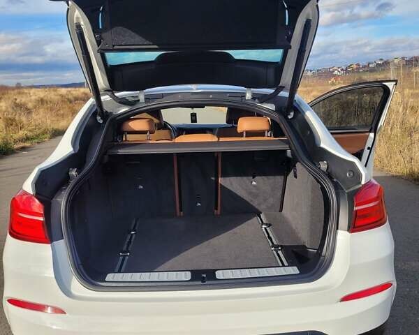 Белый БМВ Х4, объемом двигателя 2 л и пробегом 95 тыс. км за 20900 $, фото 27 на Automoto.ua