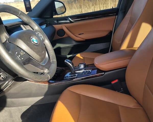 Белый БМВ Х4, объемом двигателя 2 л и пробегом 95 тыс. км за 20900 $, фото 33 на Automoto.ua