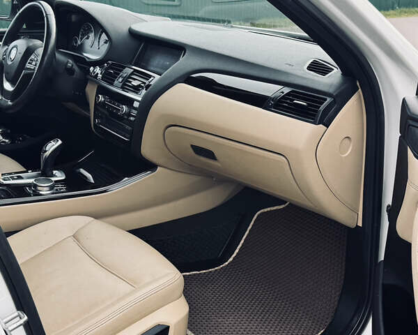Білий БМВ Х4, об'ємом двигуна 2 л та пробігом 116 тис. км за 19900 $, фото 12 на Automoto.ua