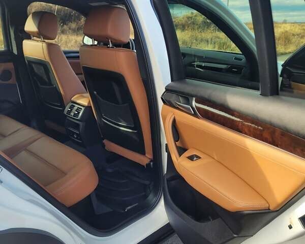 Белый БМВ Х4, объемом двигателя 2 л и пробегом 95 тыс. км за 20900 $, фото 38 на Automoto.ua