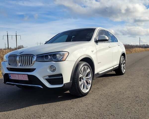 Белый БМВ Х4, объемом двигателя 2 л и пробегом 95 тыс. км за 20900 $, фото 24 на Automoto.ua