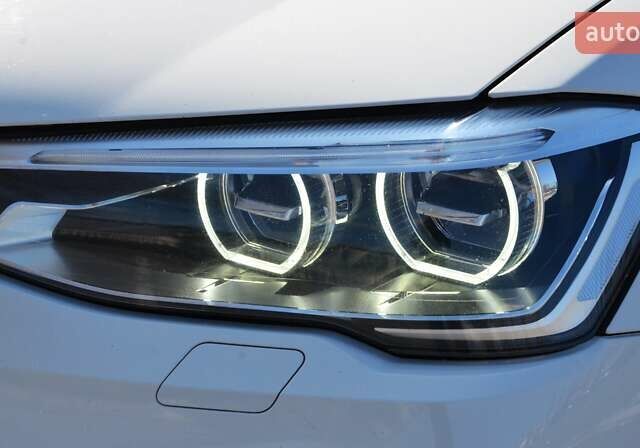 Белый БМВ Х4, объемом двигателя 2.99 л и пробегом 200 тыс. км за 29999 $, фото 13 на Automoto.ua