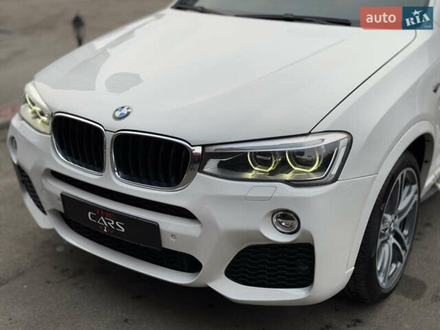 Белый БМВ Х4, объемом двигателя 2 л и пробегом 106 тыс. км за 28500 $, фото 12 на Automoto.ua