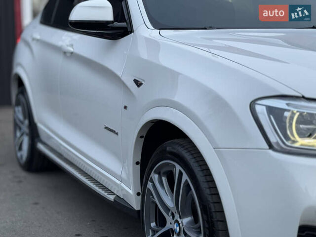 Белый БМВ Х4, объемом двигателя 2 л и пробегом 106 тыс. км за 28500 $, фото 23 на Automoto.ua