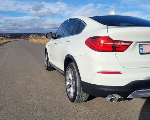 Белый БМВ Х4, объемом двигателя 2 л и пробегом 95 тыс. км за 20900 $, фото 17 на Automoto.ua