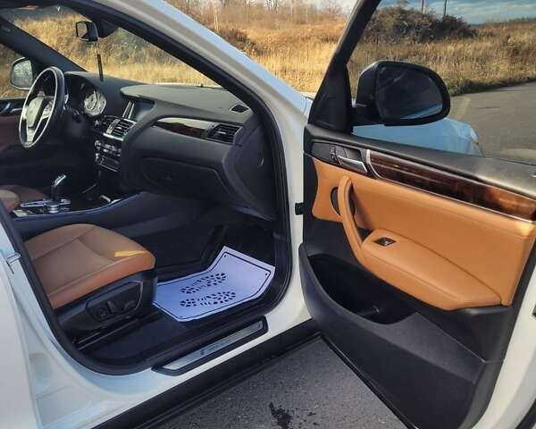 Белый БМВ Х4, объемом двигателя 2 л и пробегом 95 тыс. км за 20900 $, фото 36 на Automoto.ua