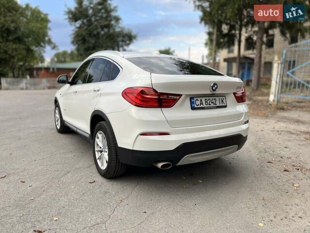 Белый БМВ Х4, объемом двигателя 2 л и пробегом 170 тыс. км за 33800 $, фото 2 на Automoto.ua