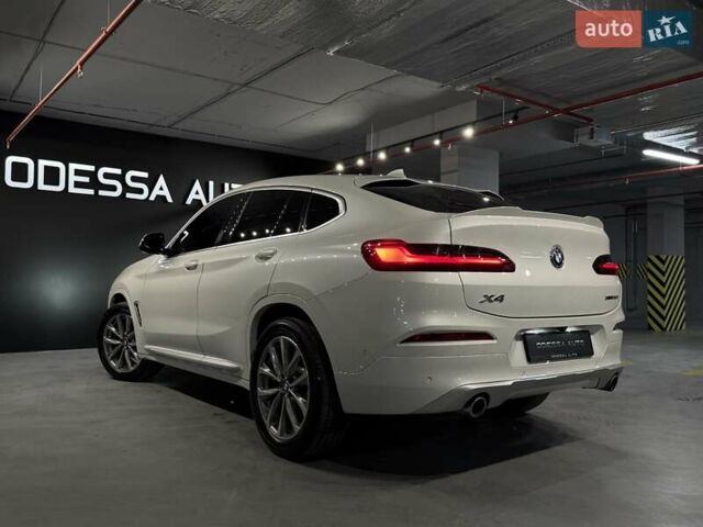 Белый БМВ Х4, объемом двигателя 2 л и пробегом 80 тыс. км за 34500 $, фото 4 на Automoto.ua