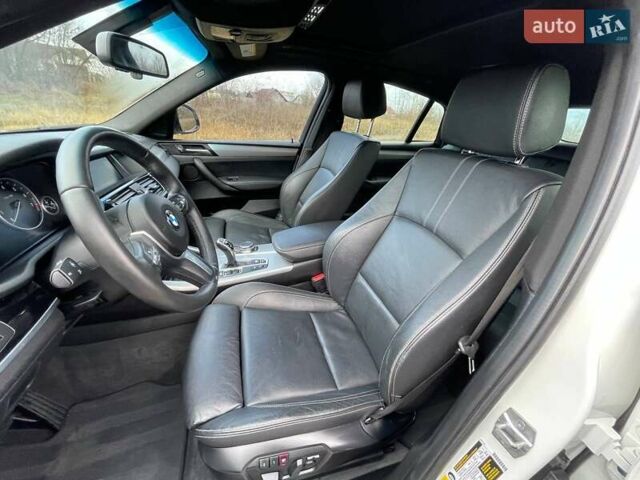 Белый БМВ Х4, объемом двигателя 2 л и пробегом 158 тыс. км за 19900 $, фото 26 на Automoto.ua