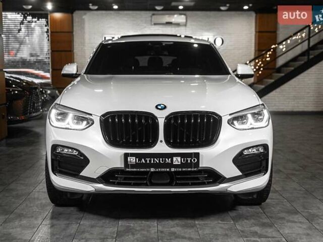 Белый БМВ Х4, объемом двигателя 2 л и пробегом 65 тыс. км за 34500 $, фото 1 на Automoto.ua