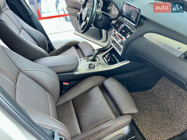 Белый БМВ Х4, объемом двигателя 2 л и пробегом 119 тыс. км за 27500 $, фото 12 на Automoto.ua
