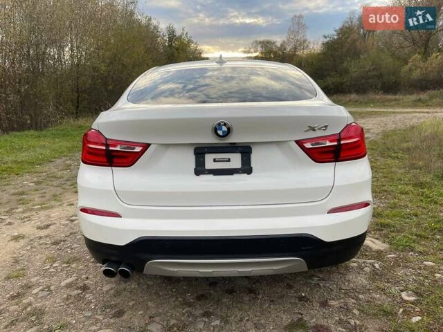 Белый БМВ Х4, объемом двигателя 2 л и пробегом 122 тыс. км за 19900 $, фото 3 на Automoto.ua