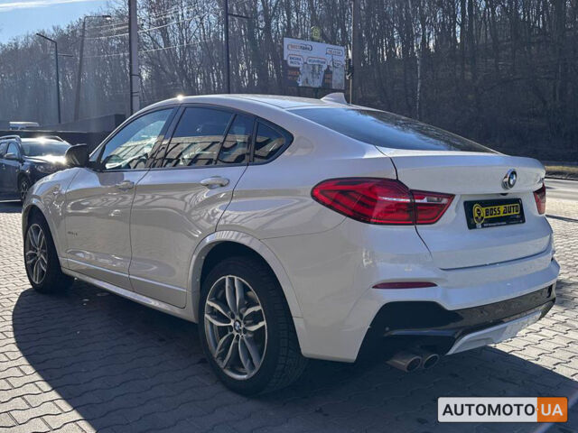 Белый БМВ Х4, объемом двигателя 2 л и пробегом 65 тыс. км за 33500 $, фото 3 на Automoto.ua
