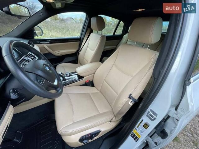 Белый БМВ Х4, объемом двигателя 2 л и пробегом 122 тыс. км за 19900 $, фото 23 на Automoto.ua