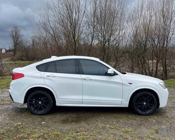 Белый БМВ Х4, объемом двигателя 2 л и пробегом 158 тыс. км за 19900 $, фото 21 на Automoto.ua