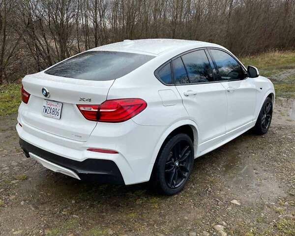 Белый БМВ Х4, объемом двигателя 2 л и пробегом 158 тыс. км за 19900 $, фото 19 на Automoto.ua