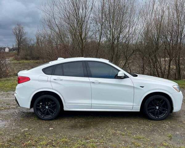 Белый БМВ Х4, объемом двигателя 2 л и пробегом 158 тыс. км за 19900 $, фото 17 на Automoto.ua