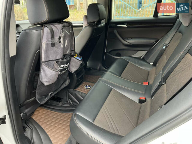 Белый БМВ Х4, объемом двигателя 2 л и пробегом 170 тыс. км за 33800 $, фото 9 на Automoto.ua