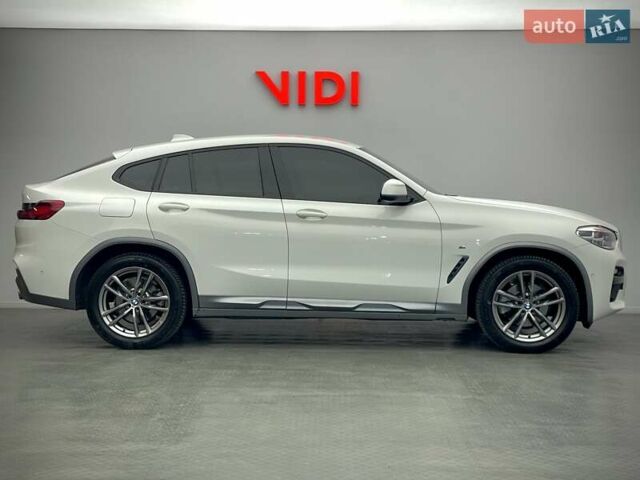 Білий БМВ Х4, об'ємом двигуна 2 л та пробігом 112 тис. км за 38579 $, фото 2 на Automoto.ua