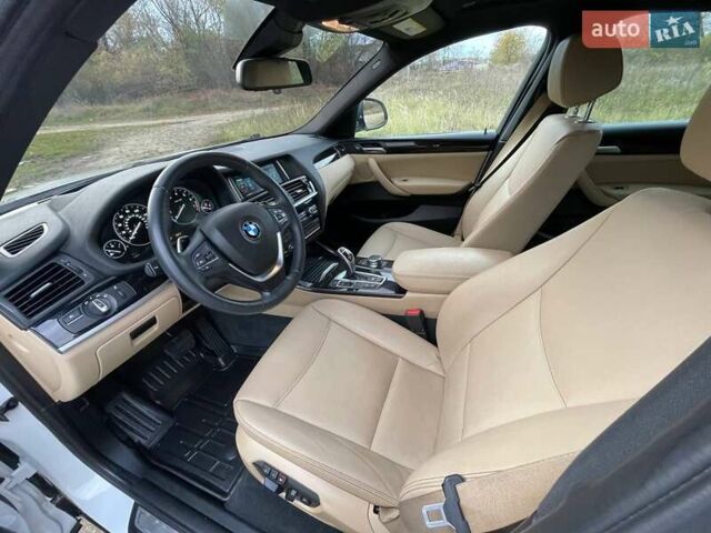 Белый БМВ Х4, объемом двигателя 2 л и пробегом 122 тыс. км за 19900 $, фото 19 на Automoto.ua