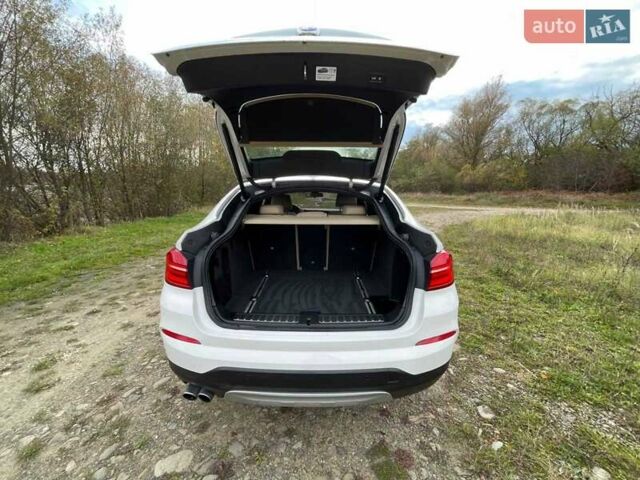 Белый БМВ Х4, объемом двигателя 2 л и пробегом 122 тыс. км за 19900 $, фото 20 на Automoto.ua