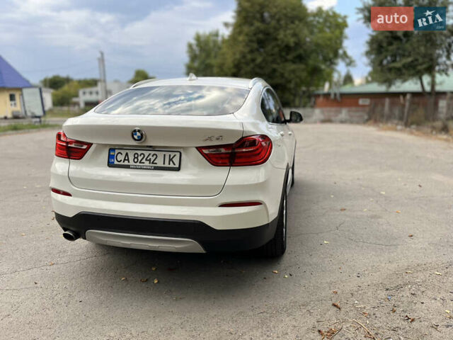 Белый БМВ Х4, объемом двигателя 2 л и пробегом 170 тыс. км за 33800 $, фото 3 на Automoto.ua