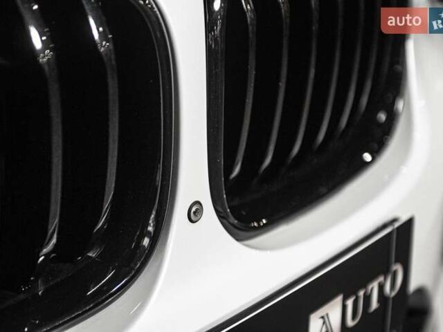 Белый БМВ Х4, объемом двигателя 2 л и пробегом 65 тыс. км за 34500 $, фото 4 на Automoto.ua