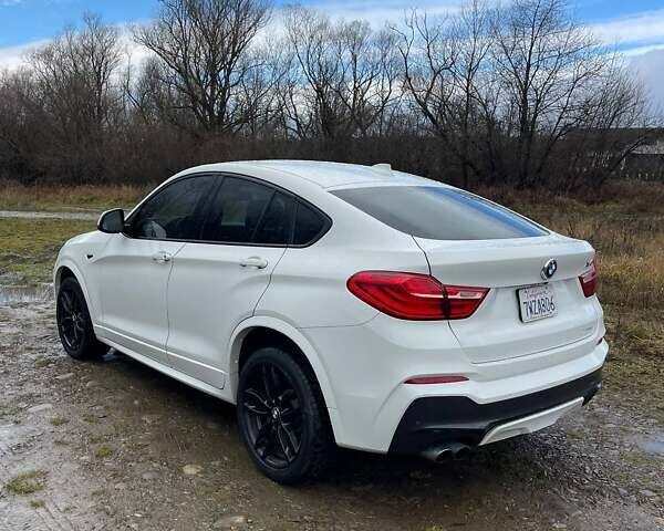 Белый БМВ Х4, объемом двигателя 2 л и пробегом 158 тыс. км за 19900 $, фото 11 на Automoto.ua