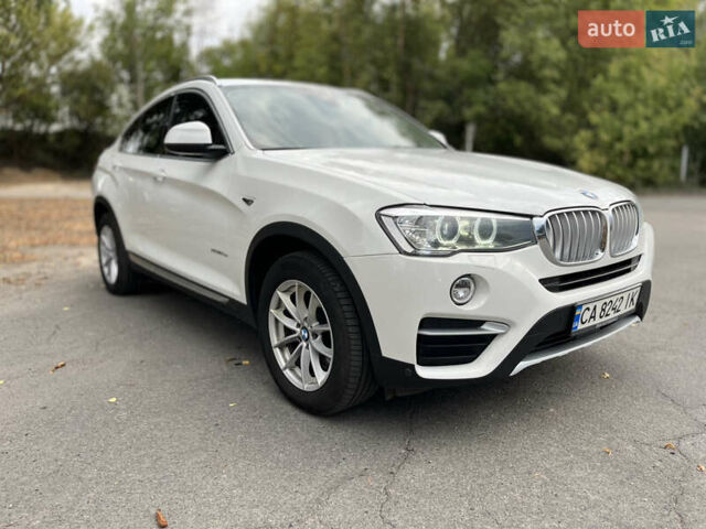 Белый БМВ Х4, объемом двигателя 2 л и пробегом 170 тыс. км за 33800 $, фото 5 на Automoto.ua