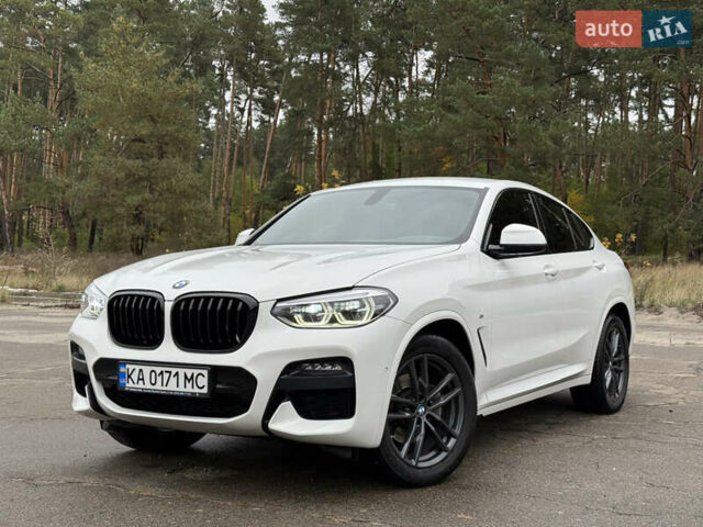 Белый БМВ Х4, объемом двигателя 2 л и пробегом 77 тыс. км за 44800 $, фото 1 на Automoto.ua