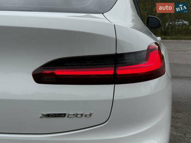 Белый БМВ Х4, объемом двигателя 2 л и пробегом 77 тыс. км за 44800 $, фото 6 на Automoto.ua