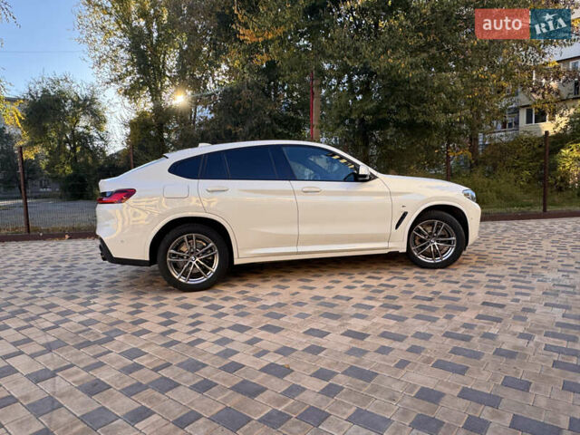 Белый БМВ Х4, объемом двигателя 2 л и пробегом 81 тыс. км за 49900 $, фото 1 на Automoto.ua