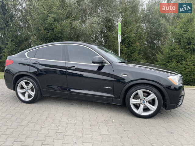 Черный БМВ Х4, объемом двигателя 2 л и пробегом 258 тыс. км за 16999 $, фото 3 на Automoto.ua