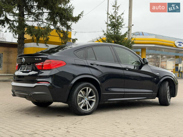 Черный БМВ Х4, объемом двигателя 2 л и пробегом 215 тыс. км за 26999 $, фото 7 на Automoto.ua