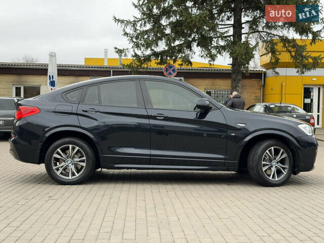 Черный БМВ Х4, объемом двигателя 2 л и пробегом 215 тыс. км за 26999 $, фото 6 на Automoto.ua