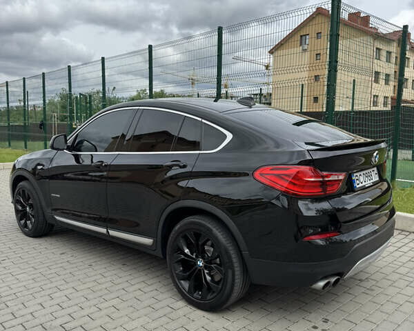БМВ Х4 2014 в Львове на Automoto.ua Черный БМВ Х4, объемом двигателя 2 л и пробегом 150 тыс. км за 20500 $, фото 7 на Automoto.ua