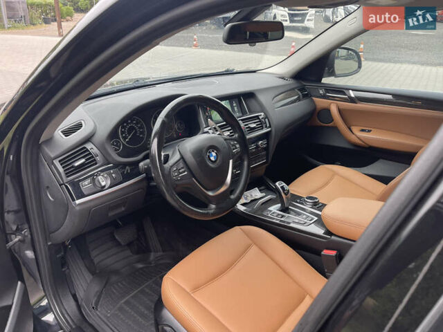 Чорний БМВ Х4, об'ємом двигуна 2 л та пробігом 258 тис. км за 15999 $, фото 14 на Automoto.ua