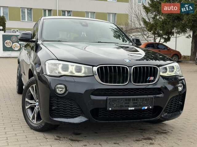 Черный БМВ Х4, объемом двигателя 2 л и пробегом 215 тыс. км за 26999 $, фото 4 на Automoto.ua