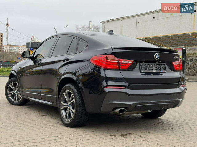 Черный БМВ Х4, объемом двигателя 2 л и пробегом 215 тыс. км за 26999 $, фото 13 на Automoto.ua