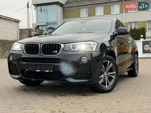 Черный БМВ Х4, объемом двигателя 2 л и пробегом 215 тыс. км за 26999 $, фото 1 на Automoto.ua