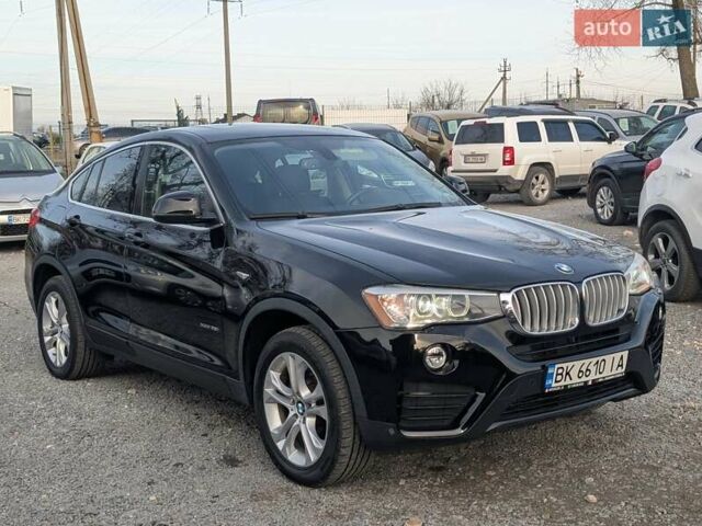 Черный БМВ Х4, объемом двигателя 2 л и пробегом 95 тыс. км за 20850 $, фото 7 на Automoto.ua
